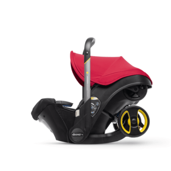 Black and red stroller with store car seat